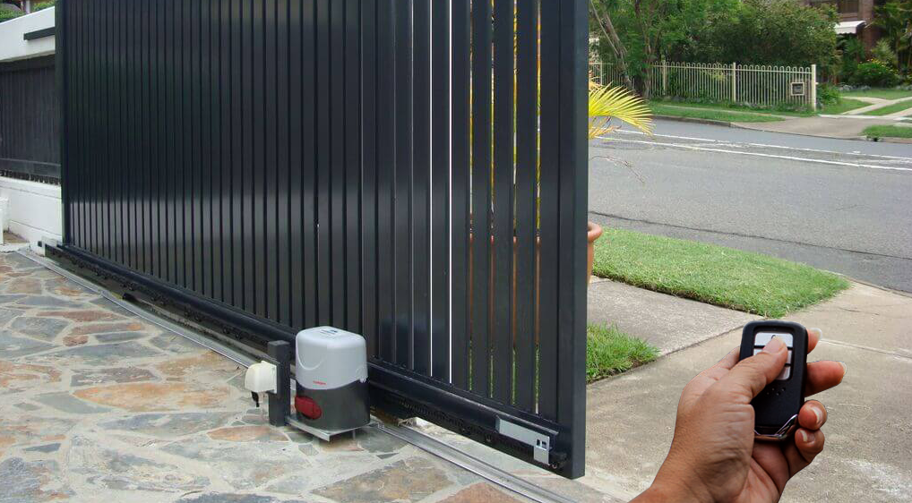 A professional technician from Fort Lauderdale FL Garage Door Repair Services performing commercial gate repair with high-quality tools and equipment.