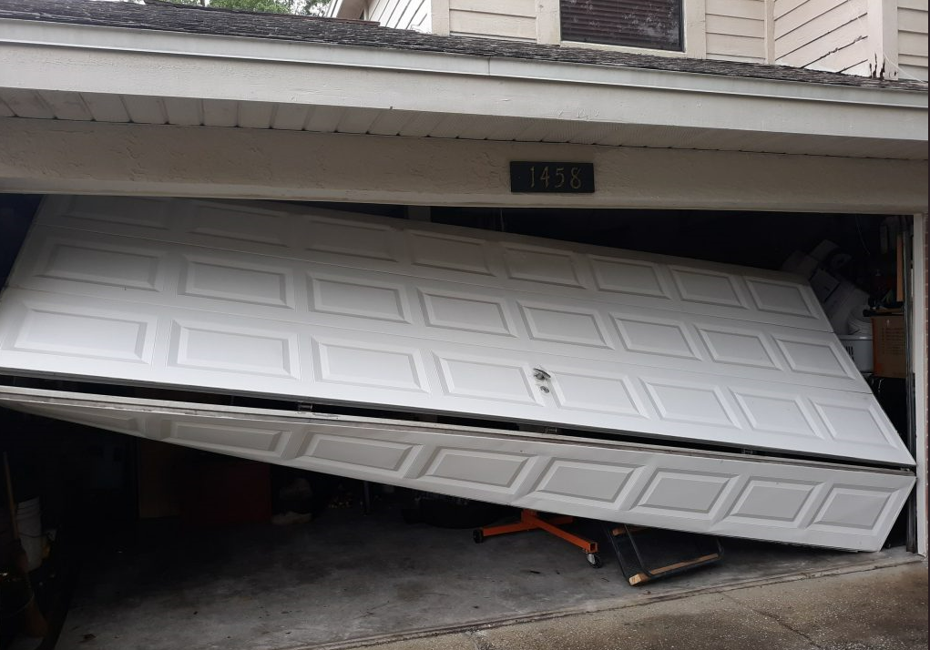 Garage door section replacement service in Fort Lauderdale, FL - Expert repair technicians ensuring seamless garage door functionality
