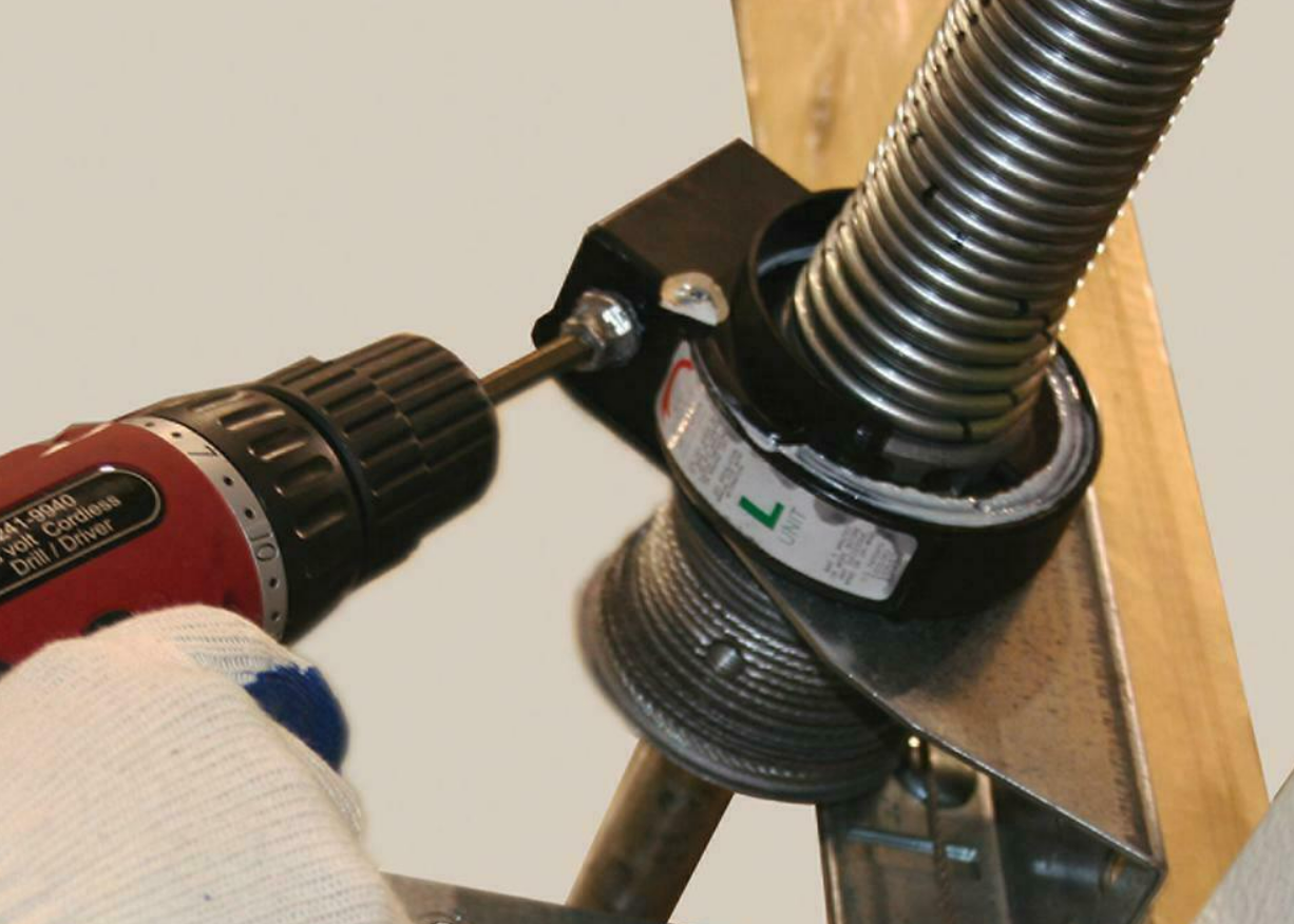 Professional technician performing a noisy garage door fix in Fort Lauderdale, FL - Expert Garage Door Repair Services