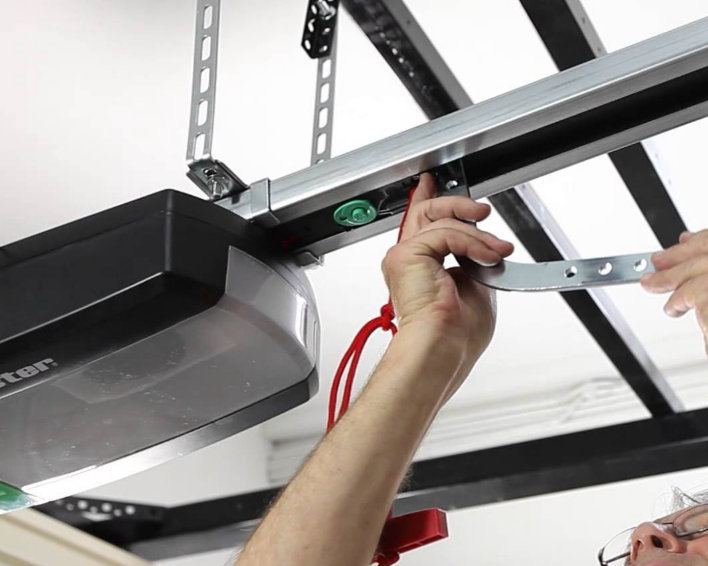 Technician performing garage door opener repair service in Fort Lauderdale, FL